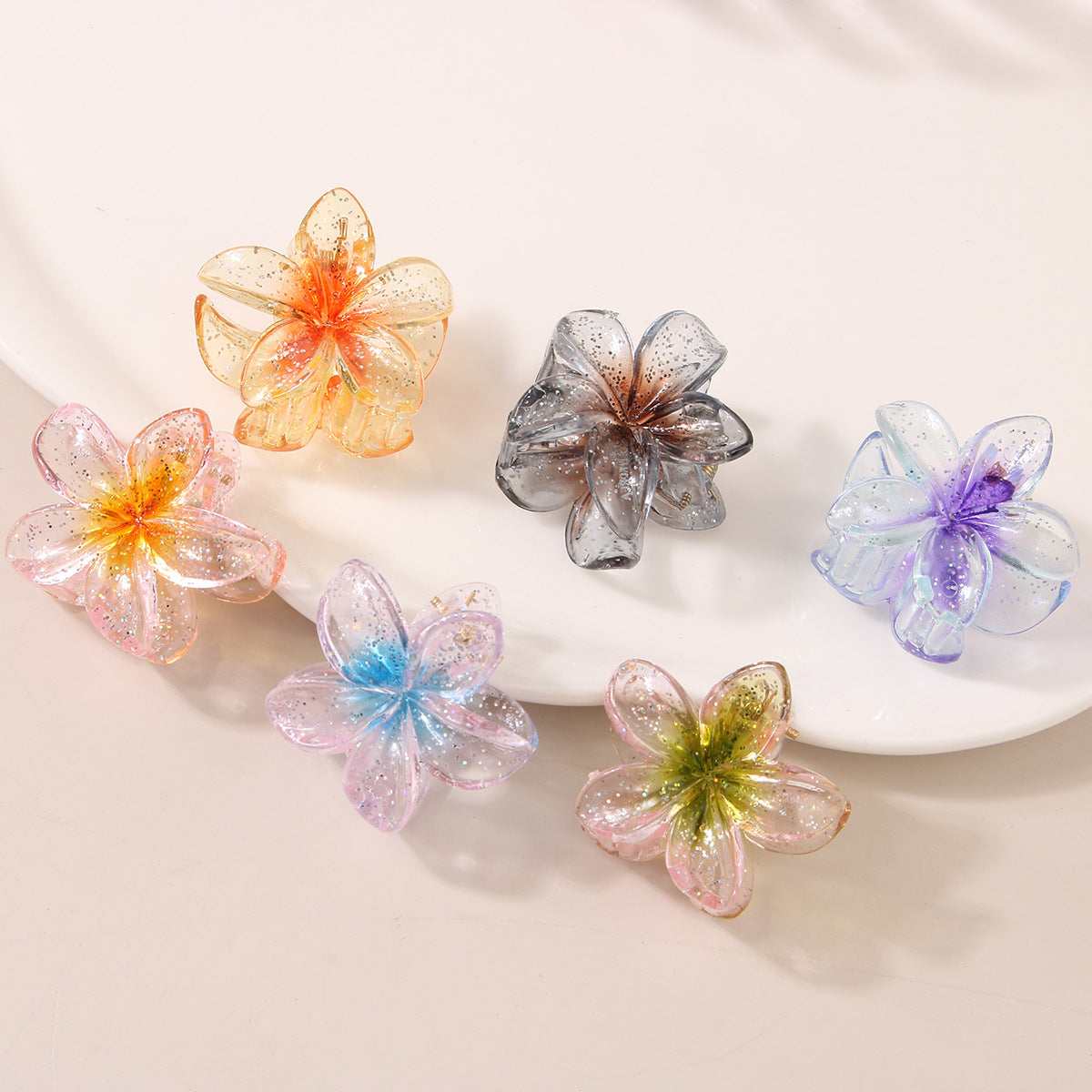 Glitzerblumen-Haarspange