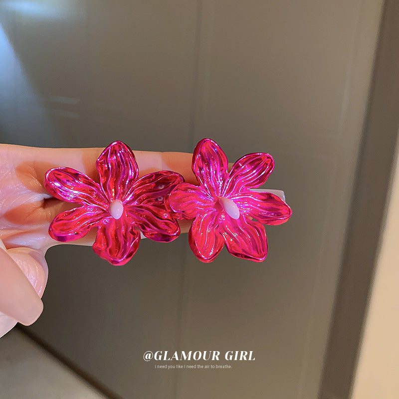 metallic pink floral earrings! on hand