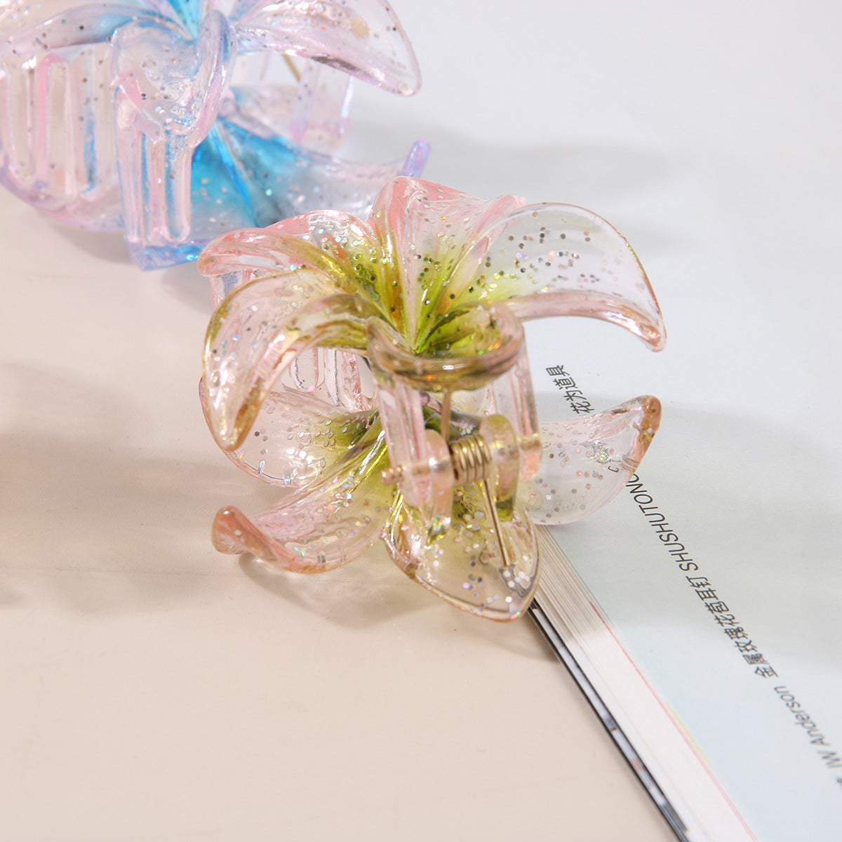 Glitzerblumen-Haarspange